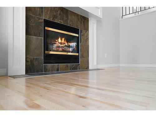 110 Valley Crest Close Nw, Calgary, AB - Indoor Photo Showing Living Room With Fireplace