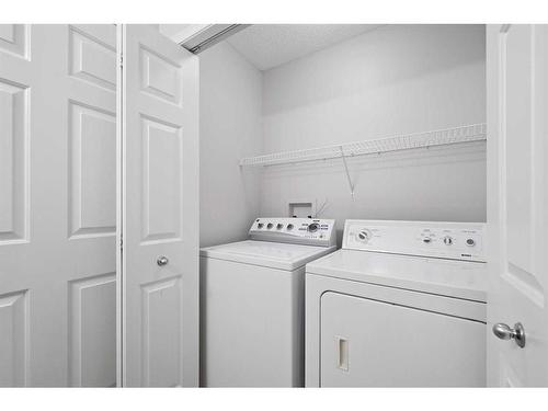 110 Valley Crest Close Nw, Calgary, AB - Indoor Photo Showing Laundry Room