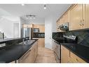 110 Valley Crest Close Nw, Calgary, AB  - Indoor Photo Showing Kitchen With Double Sink 