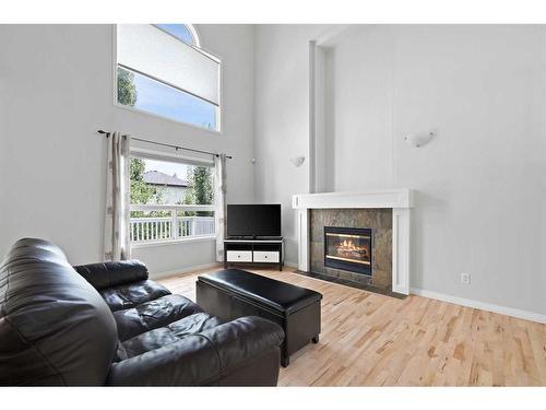 110 Valley Crest Close Nw, Calgary, AB - Indoor Photo Showing Living Room With Fireplace