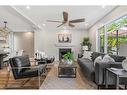 9137 21 Street Se, Calgary, AB  - Indoor Photo Showing Living Room With Fireplace 