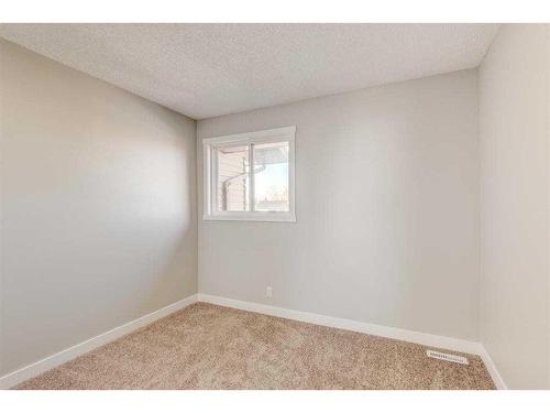 17 Castleglen Road Ne, Calgary, AB - Indoor Photo Showing Other Room