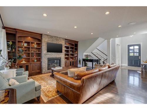 82 Aspen Cliff Close Sw, Calgary, AB - Indoor Photo Showing Living Room With Fireplace