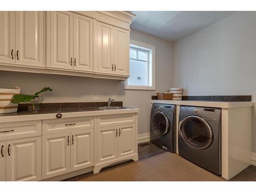 82 Aspen Cliff Close Sw, Calgary, AB - Indoor Photo Showing Laundry Room