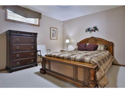 12 Arbour Crest Mount Nw, Calgary, AB - Indoor Photo Showing Bedroom