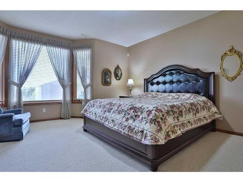 12 Arbour Crest Mount Nw, Calgary, AB - Indoor Photo Showing Bedroom