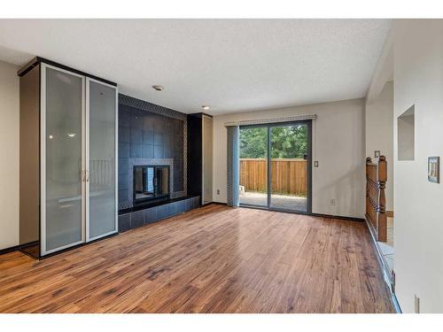 92 Deermeade Road Se, Calgary, AB - Indoor With Fireplace