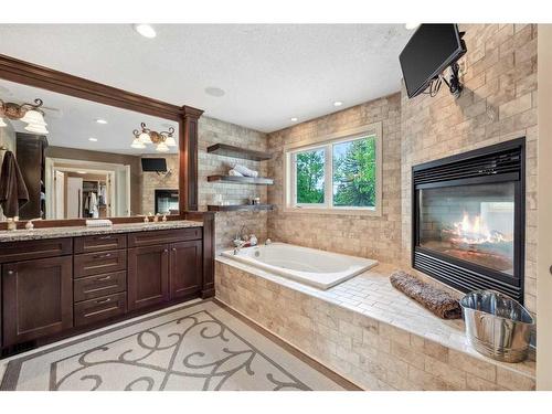 708 Willingdon Boulevard Se, Calgary, AB - Indoor Photo Showing Bathroom With Fireplace