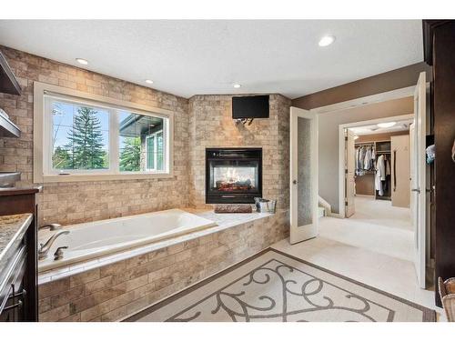 708 Willingdon Boulevard Se, Calgary, AB - Indoor Photo Showing Bathroom With Fireplace