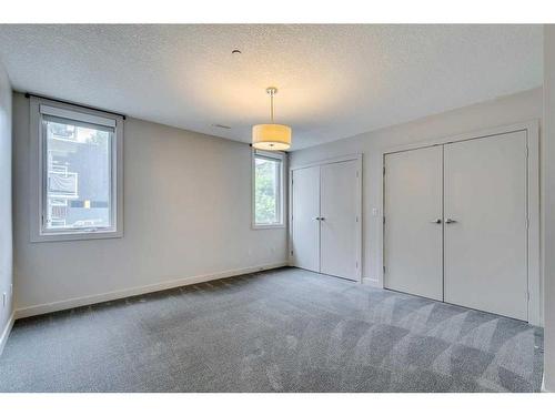 4-2101 17 Street Sw, Calgary, AB - Indoor Photo Showing Other Room