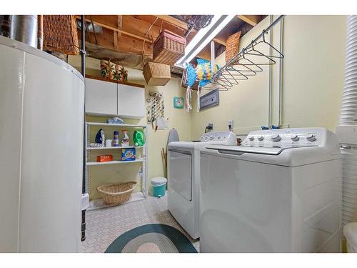 77 Sunvale Crescent Se, Calgary, AB - Indoor Photo Showing Laundry Room