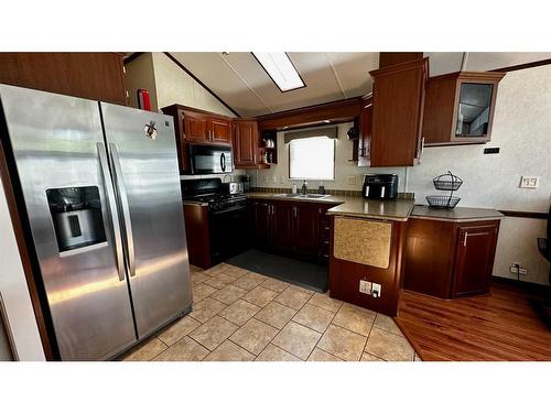 3030-35468 Range Road 30, Rural Red Deer County, AB - Indoor Photo Showing Kitchen With Double Sink