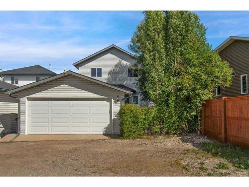 228 Sheep River Lane, Okotoks, AB - Outdoor With Exterior