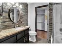 228 Sheep River Lane, Okotoks, AB  - Indoor Photo Showing Bathroom 