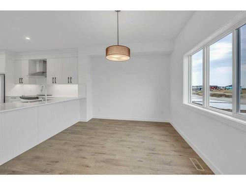 636 Dawson Drive, Chestermere, AB - Indoor Photo Showing Kitchen With Double Sink