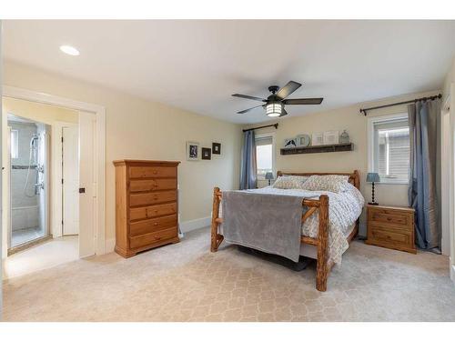 473 Sunset Link, Crossfield, AB - Indoor Photo Showing Bedroom