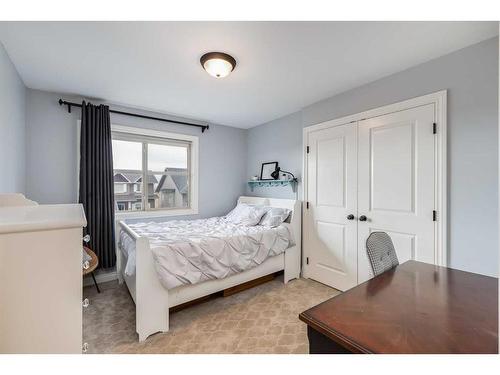 473 Sunset Link, Crossfield, AB - Indoor Photo Showing Bedroom