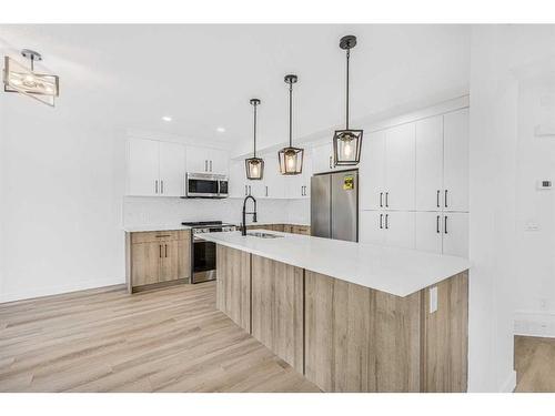 11113 Hidden Valley Drive Nw, Calgary, AB - Indoor Photo Showing Kitchen With Upgraded Kitchen