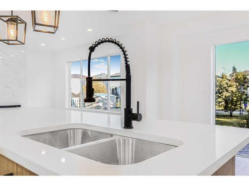 11113 Hidden Valley Drive, Calgary, AB - Indoor Photo Showing Kitchen With Double Sink