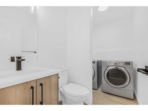 11113 Hidden Valley Drive, Calgary, AB - Indoor Photo Showing Laundry Room