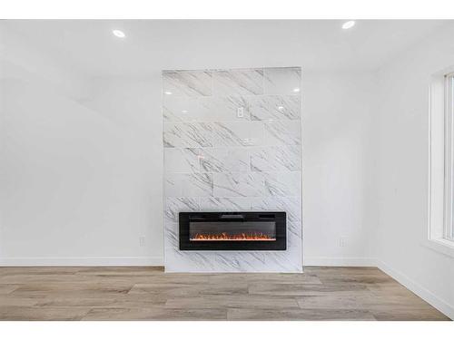 11113 Hidden Valley Drive, Calgary, AB - Indoor With Fireplace