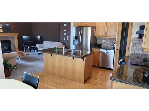 72 Shannon Gardens Sw, Calgary, AB - Indoor Photo Showing Kitchen With Double Sink