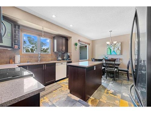 4624 Namaka Crescent Nw, Calgary, AB - Indoor Photo Showing Kitchen With Double Sink