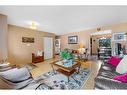 4624 Namaka Crescent Nw, Calgary, AB  - Indoor Photo Showing Living Room 