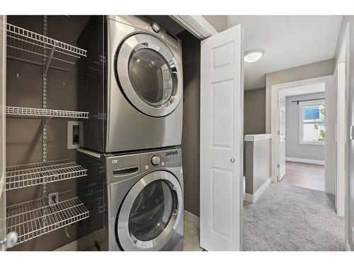 213 Bridlewood Lane Sw, Calgary, AB - Indoor Photo Showing Laundry Room