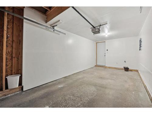 213 Bridlewood Lane Sw, Calgary, AB - Indoor Photo Showing Garage