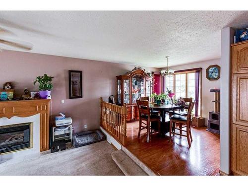 219 10 Avenue Ne, Sundre, AB - Indoor With Fireplace