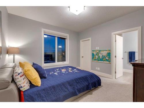 107 Mystic Ridge Park Sw, Calgary, AB - Indoor Photo Showing Bedroom