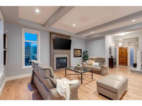 107 Mystic Ridge Park Sw, Calgary, AB - Indoor Photo Showing Living Room With Fireplace