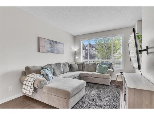 43 Copperpond Close Se, Calgary, AB - Indoor Photo Showing Living Room