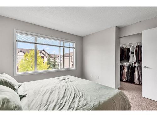 43 Copperpond Close Se, Calgary, AB - Indoor Photo Showing Bedroom