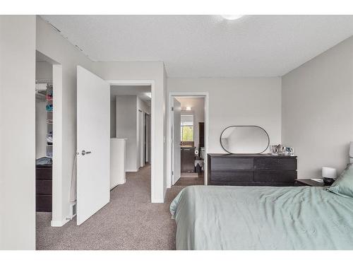 43 Copperpond Close Se, Calgary, AB - Indoor Photo Showing Bedroom