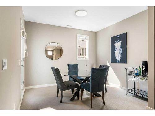 164 9 Street Ne, Calgary, AB - Indoor Photo Showing Living Room With Fireplace