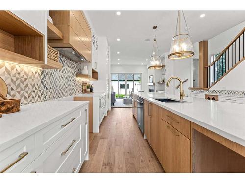 1826 19 Avenue Nw, Calgary, AB - Indoor Photo Showing Kitchen With Double Sink With Upgraded Kitchen