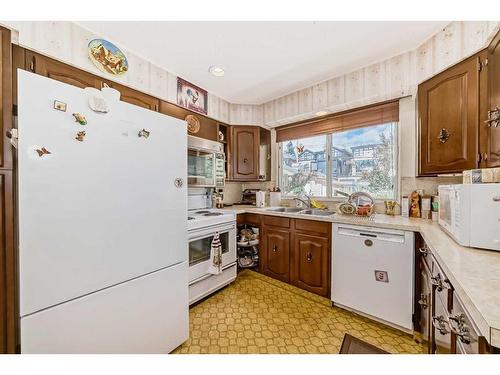 2234 7 Avenue Nw, Calgary, AB - Indoor Photo Showing Kitchen With Double Sink