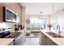 2213-60 Skyview Ranch Road Ne, Calgary, AB  - Indoor Photo Showing Kitchen With Double Sink With Upgraded Kitchen 