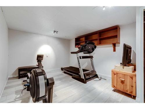 516 Willacy Drive Se, Calgary, AB - Indoor Photo Showing Gym Room