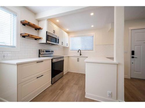 63-740 Bracewood Drive Sw, Calgary, AB - Indoor Photo Showing Kitchen With Upgraded Kitchen