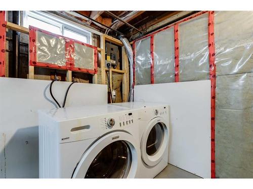 13-330 Canterbury Drive Sw, Calgary, AB - Indoor Photo Showing Laundry Room