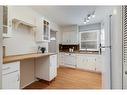 13-330 Canterbury Drive Sw, Calgary, AB  - Indoor Photo Showing Kitchen With Double Sink 