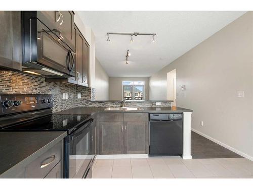 42 Kinlea Common Nw, Calgary, AB - Indoor Photo Showing Kitchen