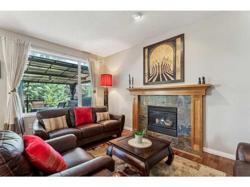 134 Valley Stream Circle Nw, Calgary, AB - Indoor Photo Showing Living Room With Fireplace