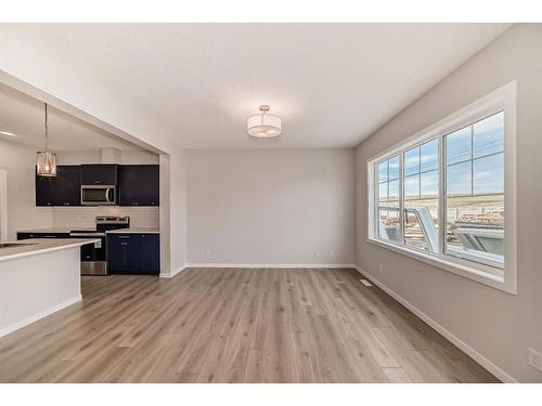 1485 Bayview Point, Airdrie, AB - Indoor Photo Showing Kitchen