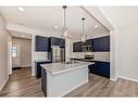 1485 Bayview Point, Airdrie, AB  - Indoor Photo Showing Kitchen With Double Sink With Upgraded Kitchen 