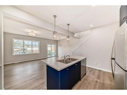 1485 Bayview Point, Airdrie, AB - Indoor Photo Showing Kitchen With Double Sink