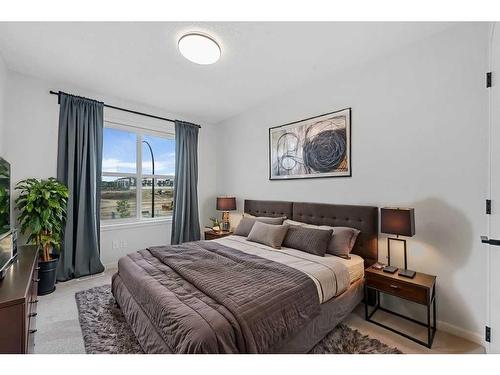 58 Seton Road Se, Calgary, AB - Indoor Photo Showing Bedroom